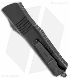 Microtech Combat Troodon D/E OTF Auto Knife Shadow Black (3.8" Black Full Serr) 8 Microtech Combat Troodon D/E OTF Auto Knife Shadow Black (3.8" Black Full Serr) -Avokelavavat Sales Store Microtech Combat Troodon DE Shadow OTF Auto Black Black Full Serr BHQ 146592 jr side