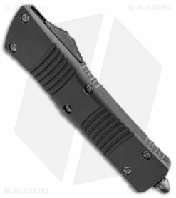 Microtech Combat Troodon D/E OTF Auto Knife Shadow Black (3.8" Black Full Serr) 7 Microtech Combat Troodon D/E OTF Auto Knife Shadow Black (3.8" Black Full Serr) -Avokelavavat Sales Store Microtech Combat Troodon DE Shadow OTF Auto Black Black Full Serr BHQ 146592 jr spine