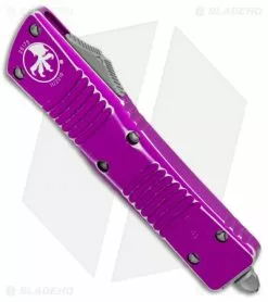 Microtech Combat Troodon D/E OTF Knife Violet Dist. (3.8" Stonewash Full Serr) -Avokelavavat Sales Store Microtech Combat Troodon DE Violet Distressed SW Full Serr 142 12DVI BHQ 104691 jr spine
