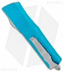 Microtech Combat Troodon OTF Knife D/E Dagger Turquoise (3.8" Satin Serr) 8 Microtech Combat Troodon OTF Knife D/E Dagger Turquoise (3.8" Satin Serr) -Avokelavavat Sales Store Microtech Combat Troodon OTF DE Dagger Turquoise Satin Serr 142 5TQ BHQ 98094 jr side 1