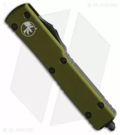 Microtech UTX-70 Dagger OTF Automatic Knife OD Green (2.4" Black Serr) -Avokelavavat Sales Store Microtech UTX 70 Dagger OTF Automatic Knife OD Green 2in Black Serr BHQ 181947 td spine
