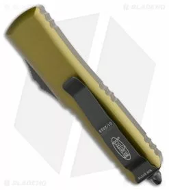 Microtech UTX-85 D/E OTF Automatic Knife OD Green (3.125" Black) 8 Microtech UTX-85 D/E OTF Automatic Knife OD Green (3.125" Black) -Avokelavavat Sales Store Microtech UTX 85 DE OTF Auto OD Green Black BHQ 81507 jr side