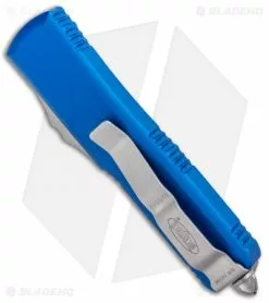 Microtech UTX-85 T/E OTF Automatic Knife Blue (3.125" Stonewash Serr) 233-11BL -Avokelavavat Sales Store Microtech UTX 85 TE OTF Auto Blue SW Serr 233 11BL BHQ 95435 jr side